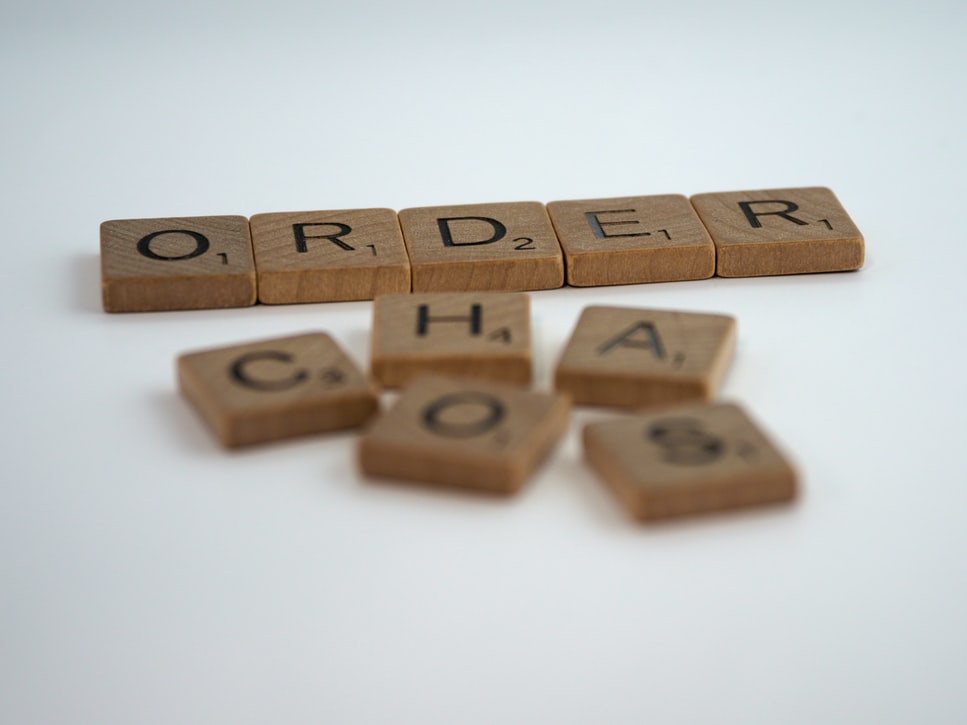 scrabble tiles that spell out "order".